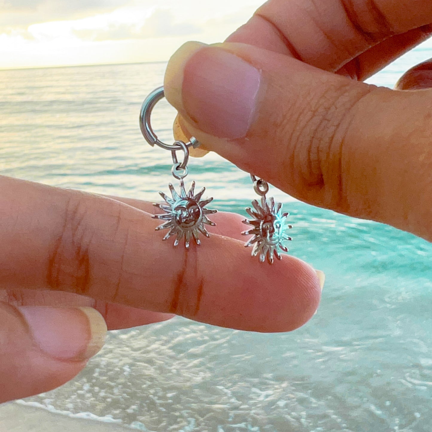 Sun silver earrings