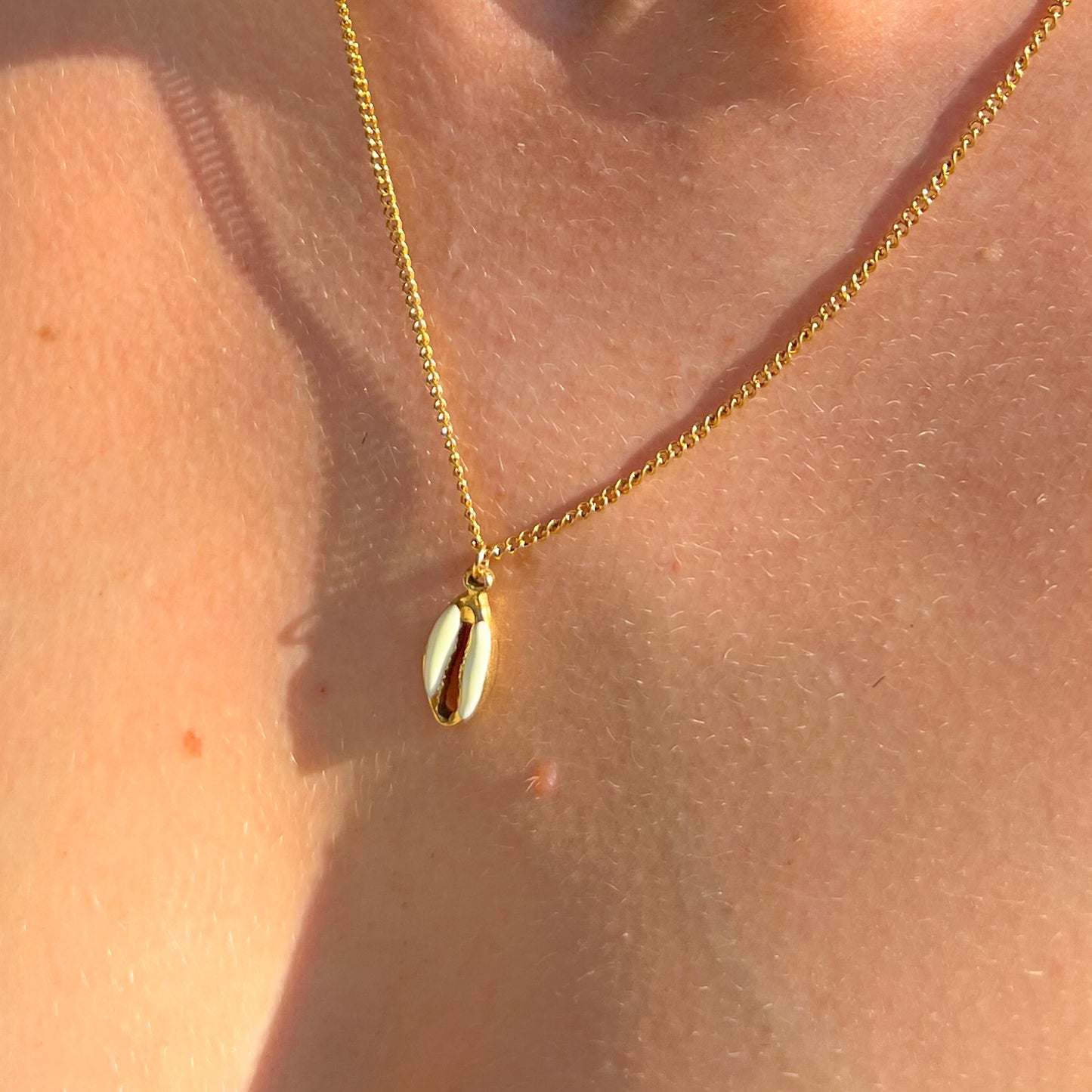 Cowrie golden necklace