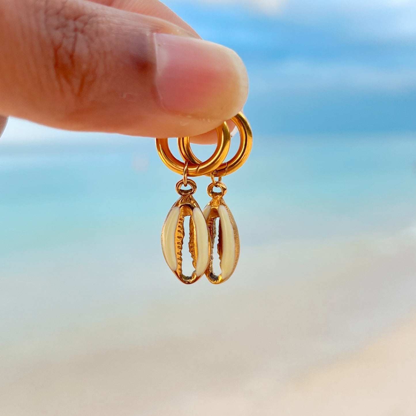 Cowrie golden earrings