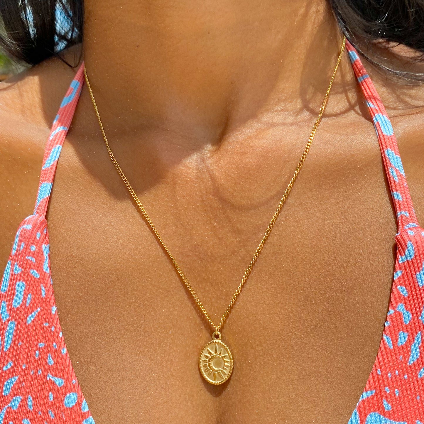 Moon and sun golden necklace